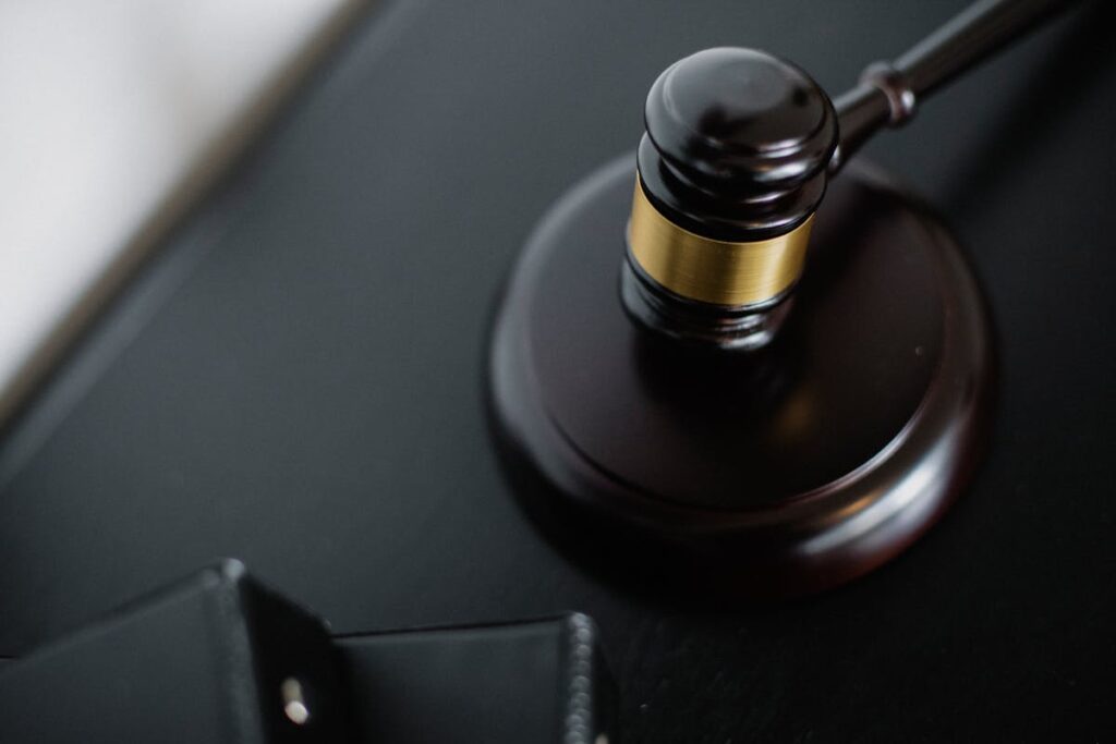 Texas employee consulting an FLSA retaliation attorney after being fired for complaining about unpaid wages