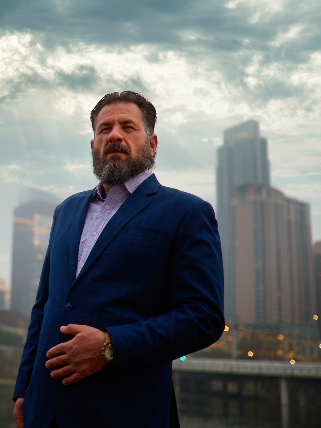 Texas employment attorney Jack Nichols with Austin skyline